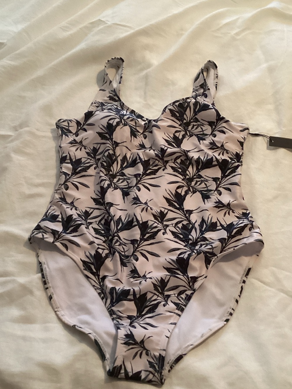 Nicole Miller Black Floral One-Piece Swimsuit on Cream